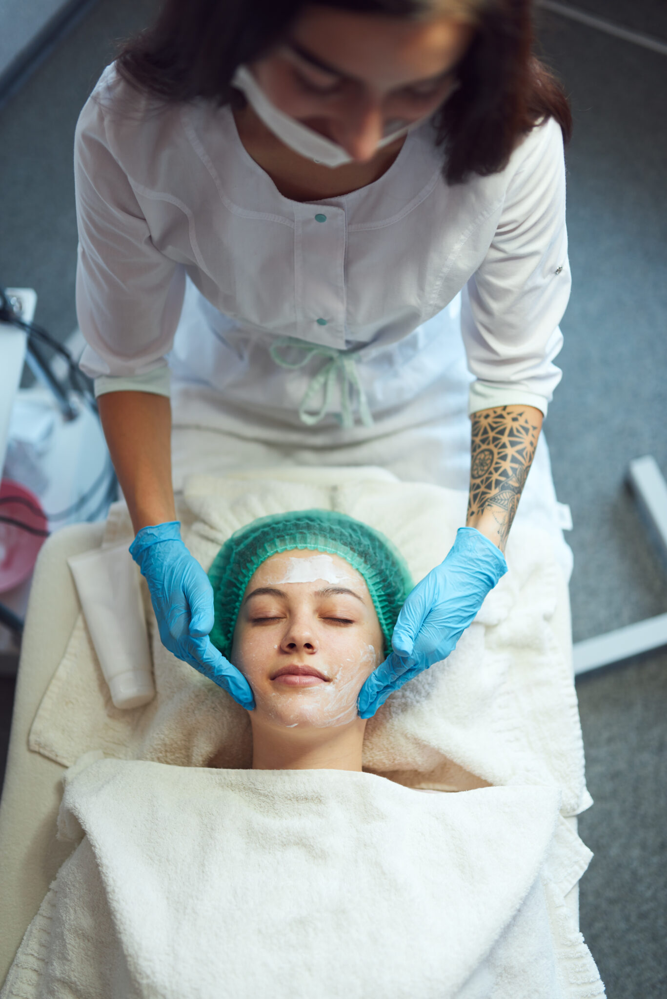 Girl enjoys cosmetology procedures in a beauty clinic.